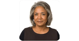 Susan, a happy senior customer, enjoying life with SharpEar supplement for natural hearing support and mental focus